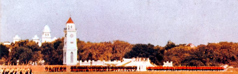 View from the parade ground showing troops on parade, Fateh Maidan Clock Tower, 1930s