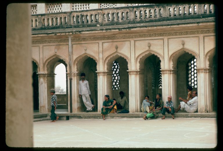 Interior, men and women resting in alcoves of upper story, Charminar, 1986