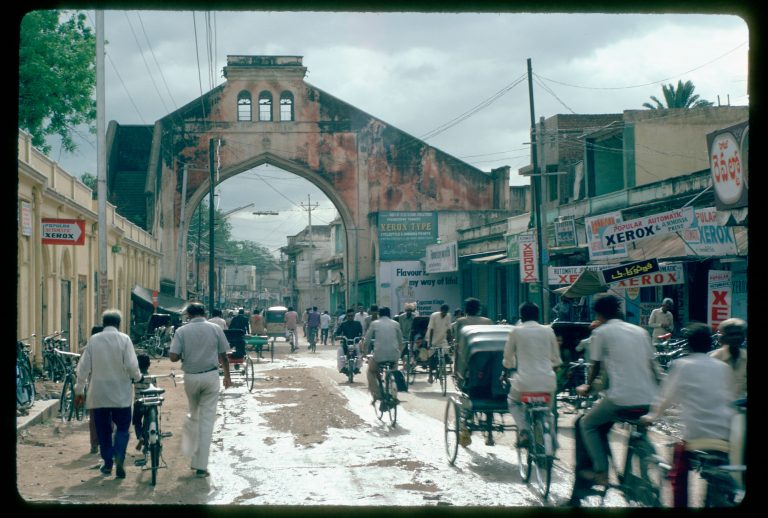 general view, view from west, showing traffic and pedestrians, 1986 (c) Arjun Mangaldas