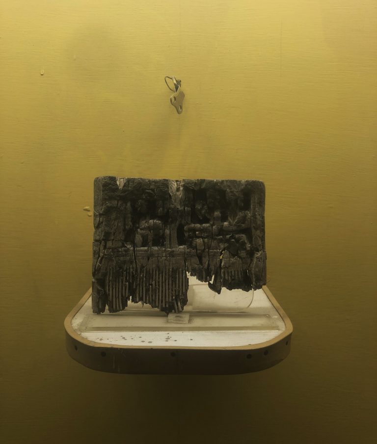 Ivory comb found at the site displayed at the Centenary Heritage Museum, 2023