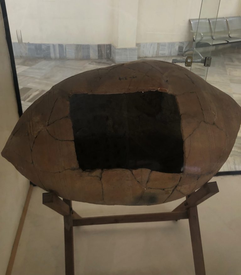 Barrel shaped sarcophagus displayed at the Centenary Heritage Museum, Hyderabad